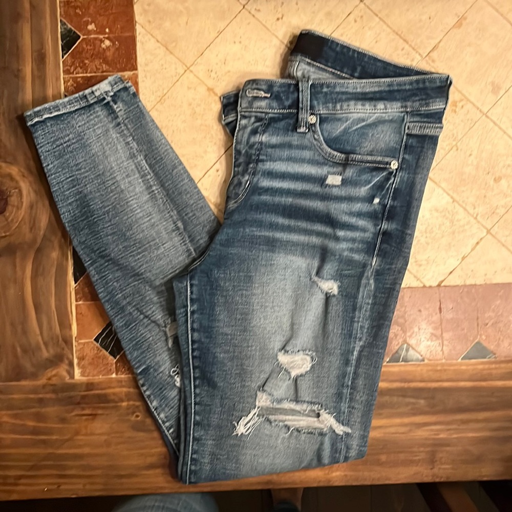 Buckle black war a few times have holes in the legs